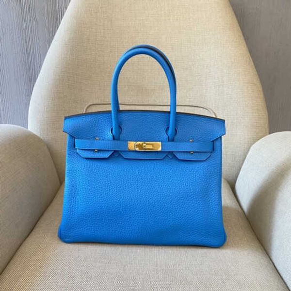 

women designer bags hand women's handbag blue gold buckle carving