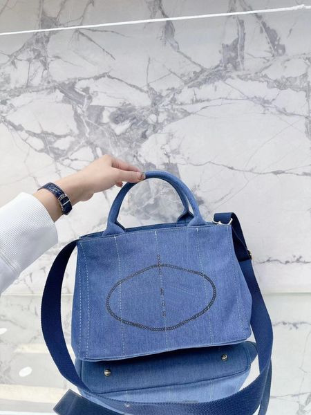 

wholesale p luxury designer brands shopping bags women triangle label waterproof leisure travel bag large capacity denim tote bag mommy ladi