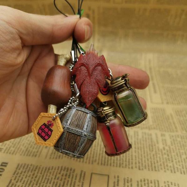 

key rings monster hunter game keychain prop model figure bag pendant ornaments accessories small gift j230222, Slivery;golden