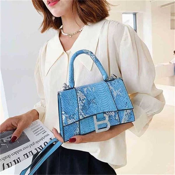 

handbag 2023 new bag female splicing hand style letter messenger snake pattern