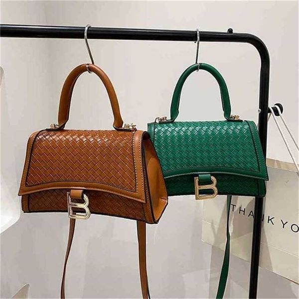 

handbag 2023 new bag woven indentation hand light luxury texture niche
