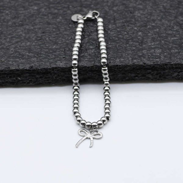 

premium tiffay handmade stainless steel color-preserving bow bracelet korean version simple hand-stranded round bead, Black