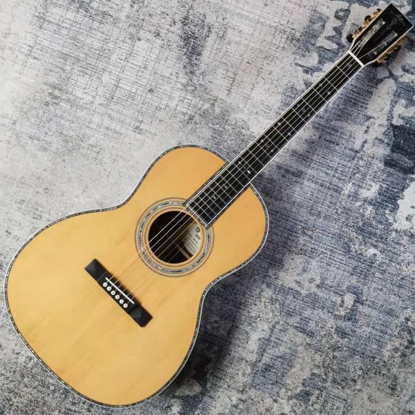 

the 39 "ooo series refers to playing acoustic guitar