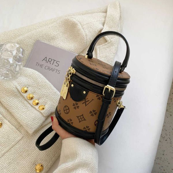 

70% 2023 new shoulder bag bucket spring new hand-held flower small commuting round messenger femalehigh