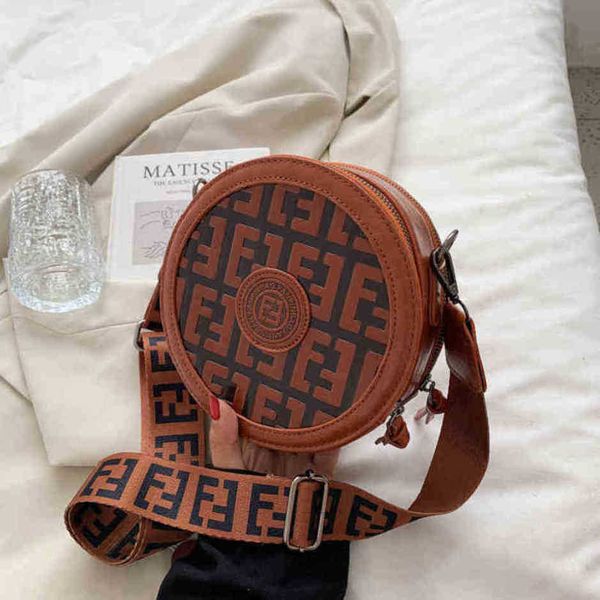 

2023 new luxury fashion bag hand small round simple wide single diagonalhigh