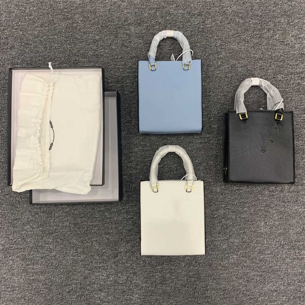 

2023 new shoulder bag new music cross pattern vertical small tot messenger shoulder portable women's baghigh
