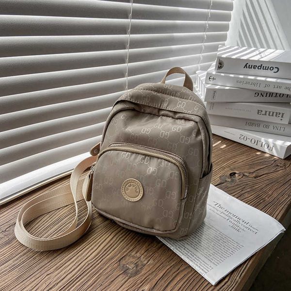 

2023 fashion letters designer bags bag women's light canvas style shoulder versatile trend messenger bag leisure backpack women handbag