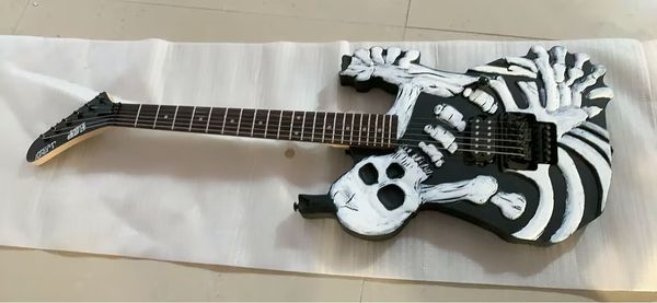

hand carved george lynch skull electric guitar floyd rose tremolo bridge, maple neck, black hardware