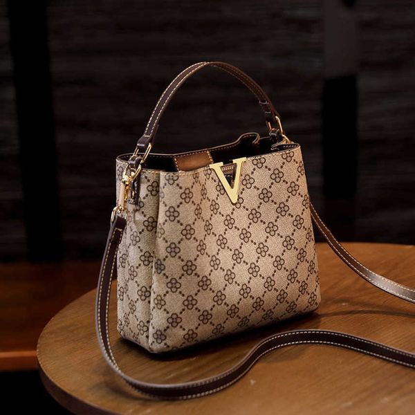 

crossbody bags 2023 new fashion large-capacity portable bucket women's summer small design one-shoulder cross-body bag shoulder handbag