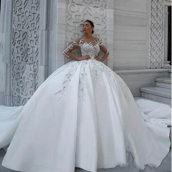 

luxurious crystal wedding dresses beaded ball gown with illusion bodice long sleeve monarch train wedding dress, White