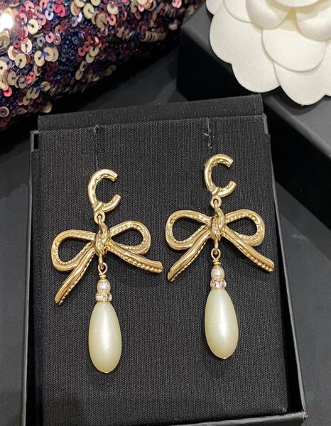 

2022 charm drop earring with nature shell beads and knot shape in 18k gold plated for women wedding jewelry gift have 2031630, Golden