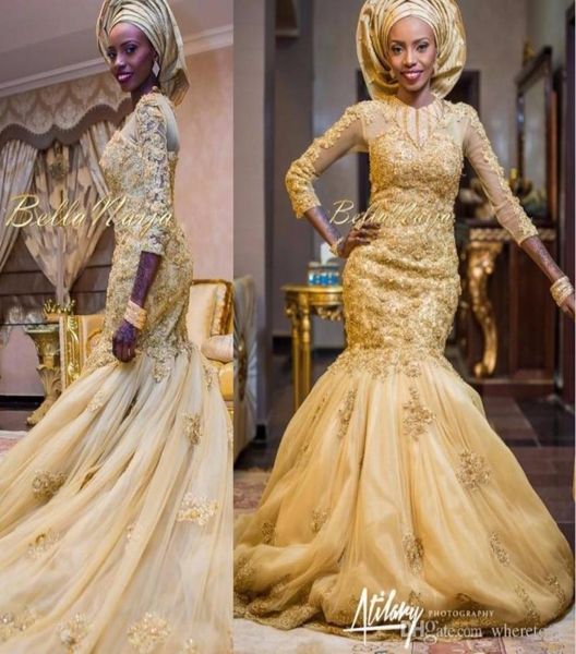 

2017 arabic mermaid gold lace wedding dresses african nigerian appliques three quarter sleeves bridal gowns with tulle wrap1117266, White