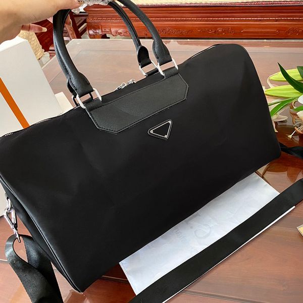

designer bag big travel bag men's huge duffle large capacity triangle mark nylon available for men and women fashion trend new launch 4