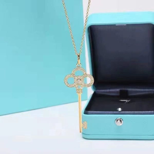 

tiffanyy diamond and crown key pendant necklace: delicate 925 sterling silver jewelry accessory for women, a thoughtful gift for girlfriends