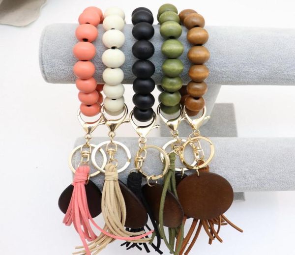 

foreign trade korea velvet tassel disc water drop wood chip bracelet printable pendant elastic cord keychain multicolor choice2228197, Golden;silver