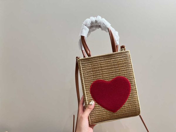

limited edition lafite grass tote bag with red plush heart