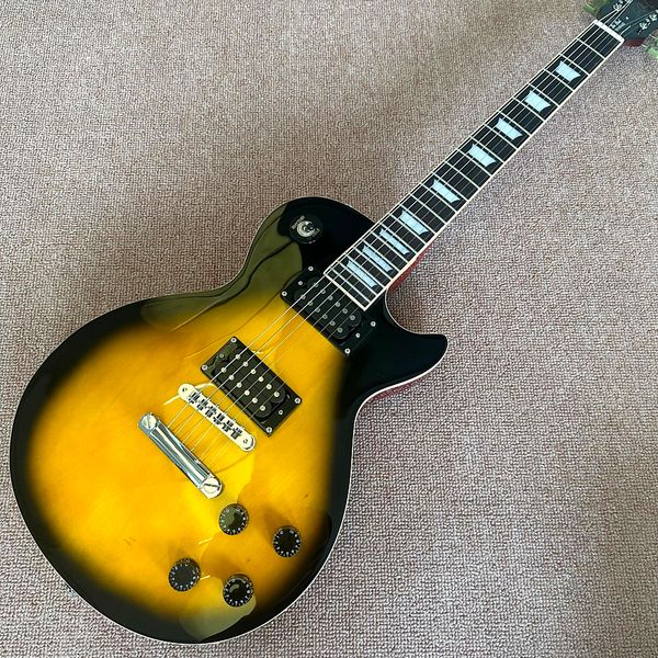 

custom shop, lp standard electric guitar, one piece neck, yellow black welt, tune-o-matic bridge, mahogany binding, ing