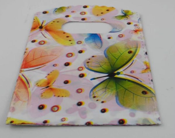 

new 500pcs shopping butterfly plastic packing gift bag 15x9cm 3310426, Pink;blue