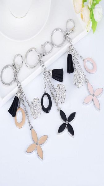 

keychains creative simple fourleaf clover keychain flowers key chain car ring female bag charm pendant fashion tassels keyringske7629909, Silver