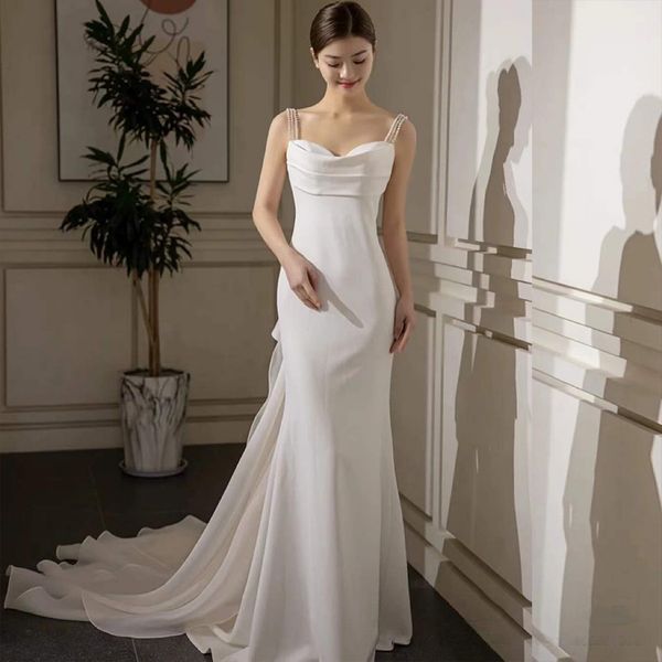 

spaghetti strap white wedding dresses satin beaded pearls strapless fairy long mermaid ribbon tailing formal bridal gowns