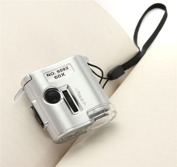 

selling 60x microscope illuminated magnifier glass jeweler loupe lens with led uv light watch repair tool7916844
