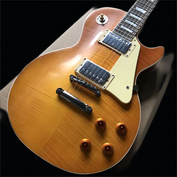 

mahogany fingerboard electric guitar, honey exploding maple red back, solid mahogany body, chrome hardware, ing