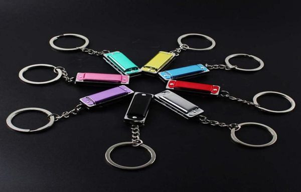 

100pcs lot metal 4 holes mini harmonica keychain children toy039s keyring kid039s gifts key chain bags mobile key rings232s2777648, Slivery;golden