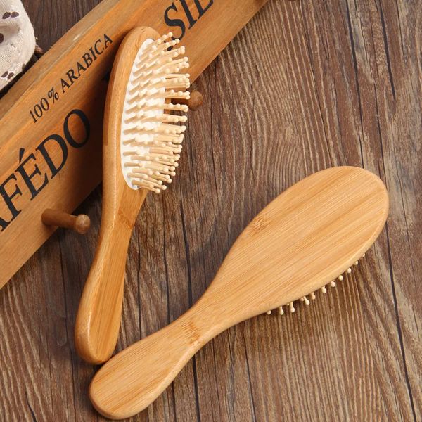 

wholesale household sundries natural bamboo brush healthy care massage combs antistatic detangling airbag hairbrush styling tool