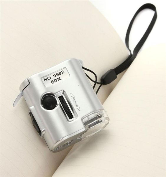 

selling 60x microscope illuminated magnifier glass jeweler loupe lens with led uv light watch repair tool3600688