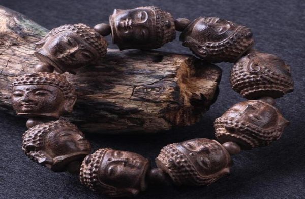 

sandal wood beads hand engraving shakya muni buddha head bracelet on hand wood beads buddha head bracelets1556119, Black