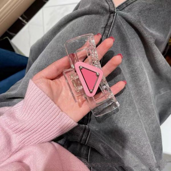 

pink green triangle label large transparent pvc claw clip for women jaw clip wholesale