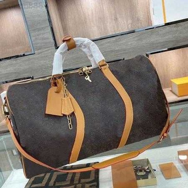 

2023 men duffle bags women travel hand luggage luxury designer bag pu leather handbags large cross body totes 50cm