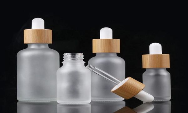 

10ml 15ml 20ml 30ml frosted clear glass dropper bottle with bamboo lid cap essential oil glass bottle frosted green eea18179720376