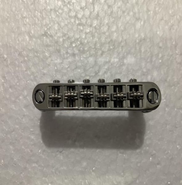 

1set of roller saddle tuneomatic chrome bridge for electric guitars2064550