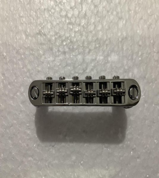 

1set of roller saddle tuneomatic chrome bridge for electric guitars6113351