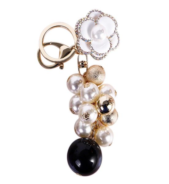 

keychains creative flower pearl keychain women bag zipper charms crystal rhinestone key chain ring fashion holder car keyrings tri7455663, Silver