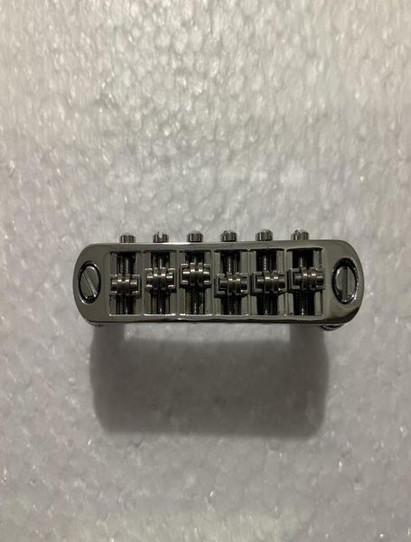 

1set of roller saddle tuneomatic chrome bridge for electric guitars3698660