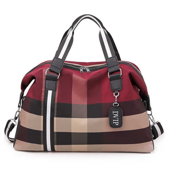 

nxy duffel bag shoulder sports portable folding fitness travel women's short trip business single luggage storage 230424