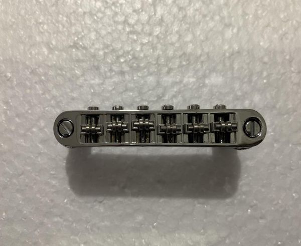 

1set of roller saddle tuneomatic chrome bridge for electric guitars7360730
