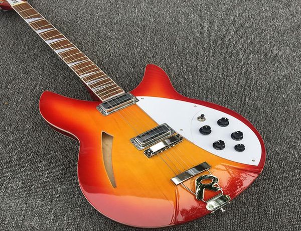 

highquality 12string electric guitar with two pickups halfempty basswood body bright orange paint5926983