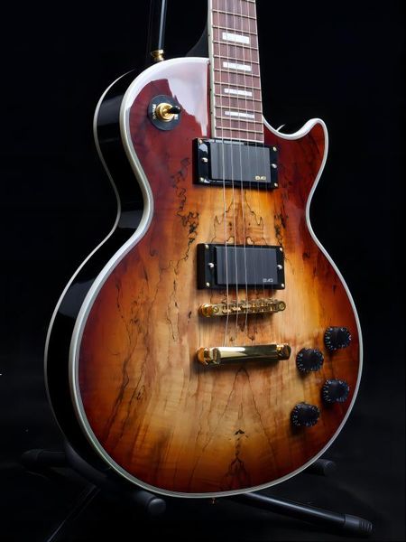 

rotting acoustic guitars, gold hardware, smoked guitars