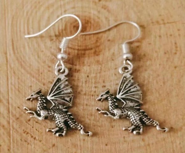 

new metal crescent alloy flying dragonpterosaurcrocodile earring friendship charm drape earring diy women jewelry gifts 2364729968, Silver