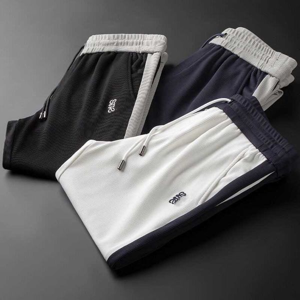 

light luxury trousers designer pants summer thin section contrast color slacks mens slim straight sweatpants embroidery tie-up pants, White;black