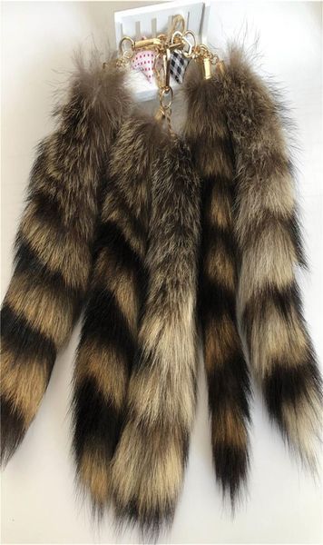 

10pcslot real american raccoon fur tail keychians plush pom poms women gifts keyrings car keychain bag charm9546347, Silver