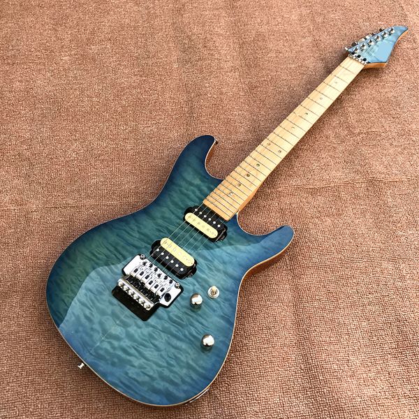 

custom shop, blue quilted maple electric guitars, branded hardware guitars, ing