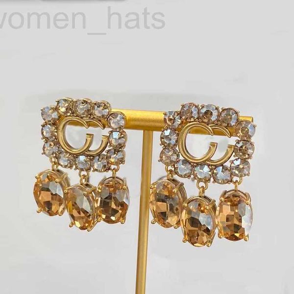 

charm designer bright yellthree-dimensional crystal pendant rm luxury earrings. sparkling rhinestones, gold-plated . designer earrings, pres, Golden