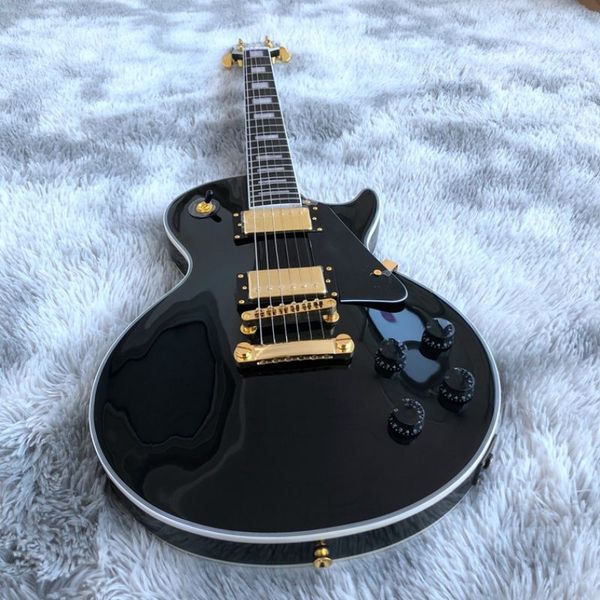 

ebony fingerboard electric guitar fret binding mahogany wood body black color