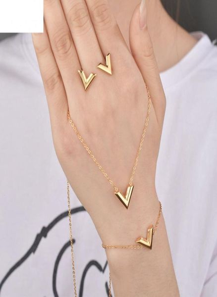 

letter v charm bracelet necklace earrings sets for women stainless steel silver gold chain bracelet v triangle cute stud earrings1698171