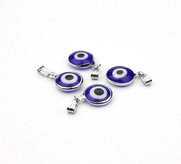 

charm whole fashion jewelrycharms 10pcslot alloy metal silver color blue glass round evil eye charms pendant jewelry findings2392094