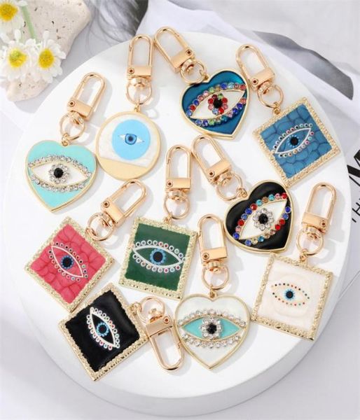 

colorful enamel evil eye keychains car bag decorate key chain6480334, Silver